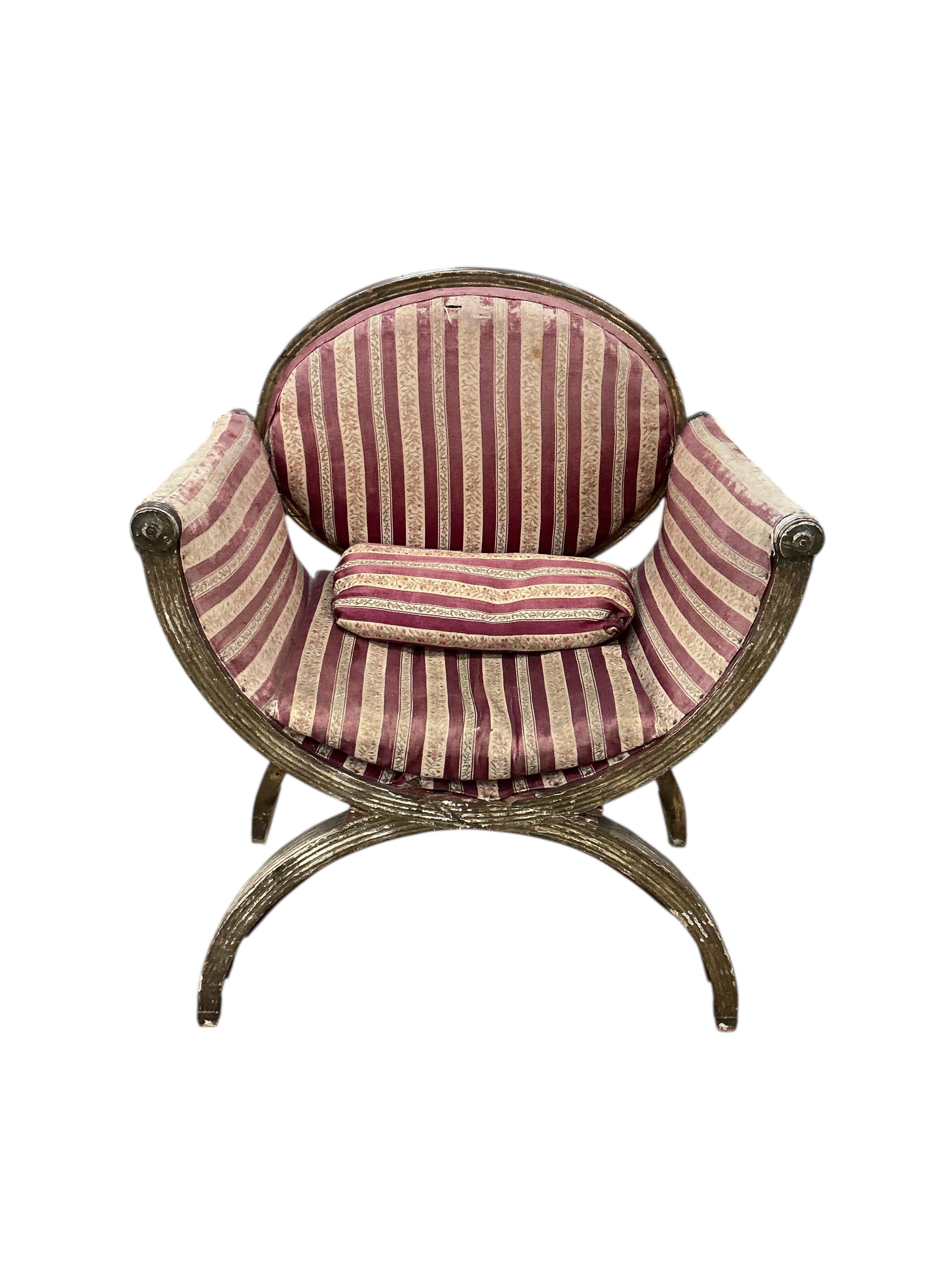 A Regency gilt 'X' framed chair, width 68cm, depth 42cm, height 84cm